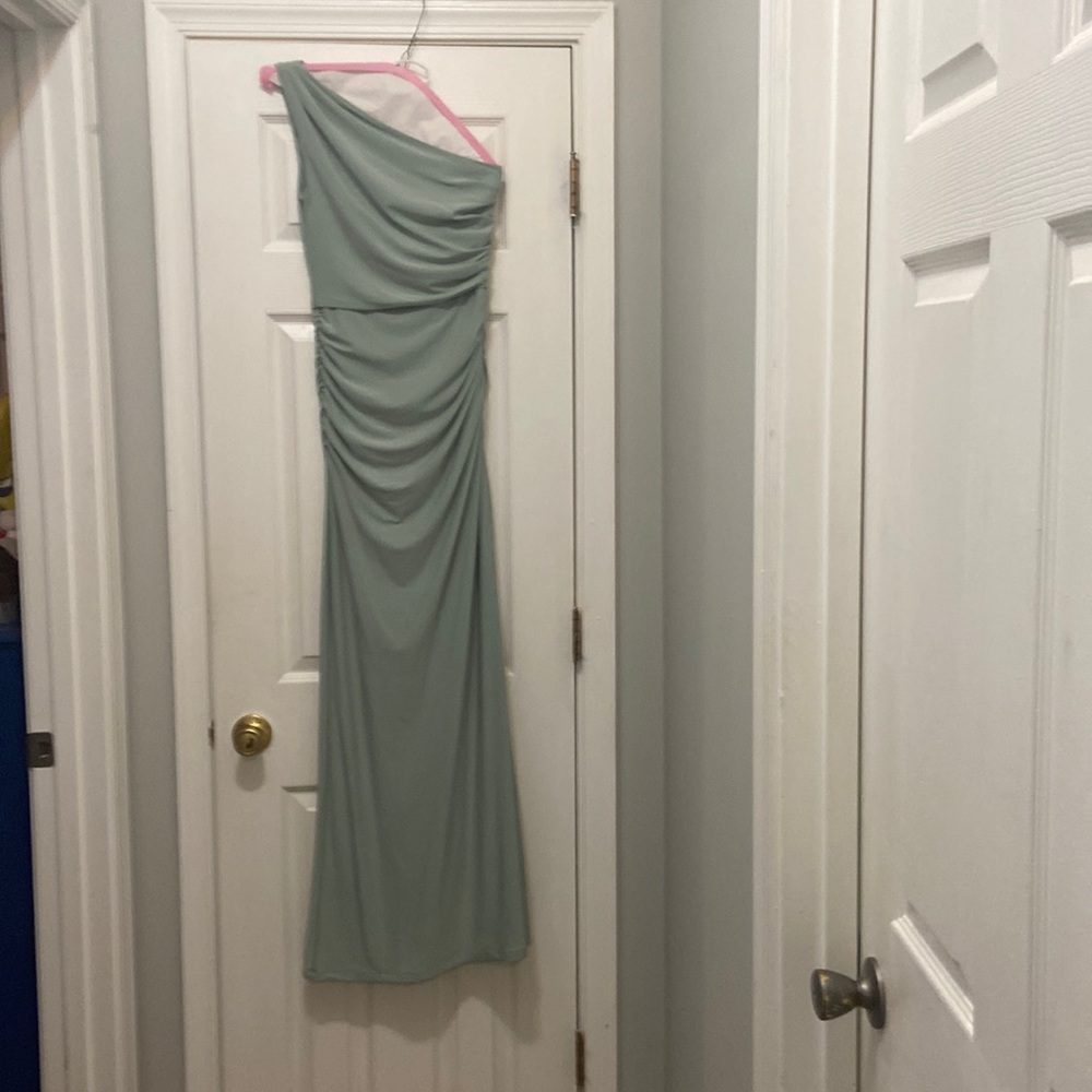 One shoulder long evening gown with roaching and a slit sage green